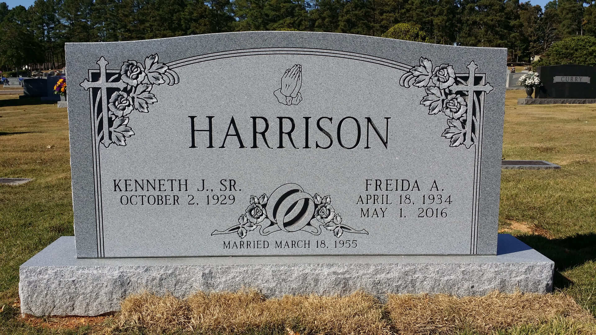 A memorial slab for Harrison at the graveyard