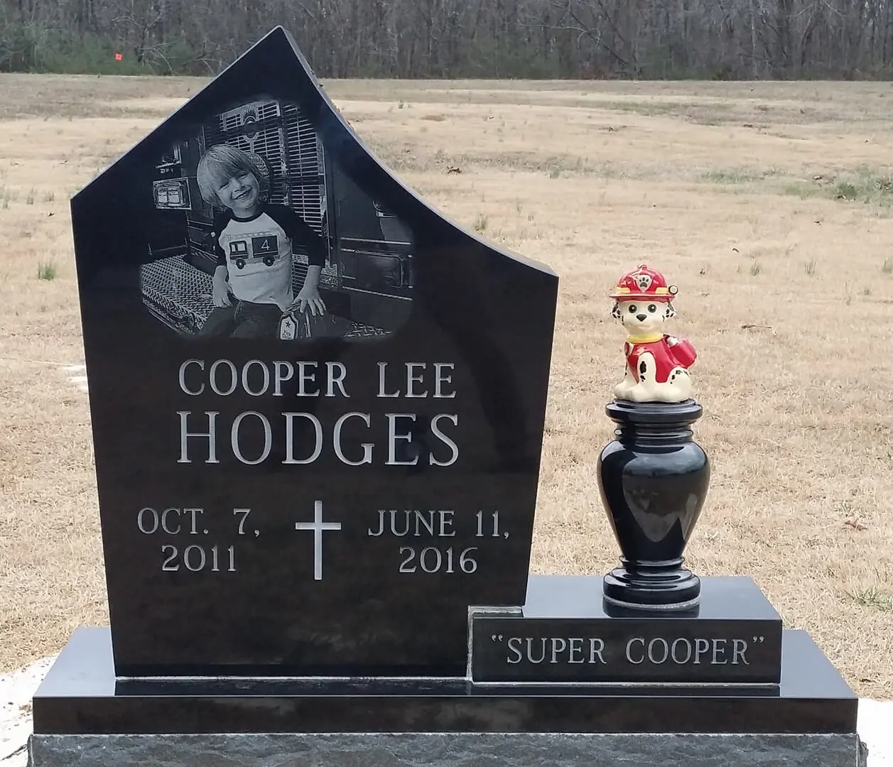 A memorial slab with the name Copper Lee Hodges