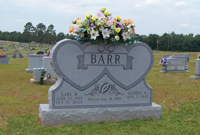 A memorial slab for Earl B. and Gloria B.