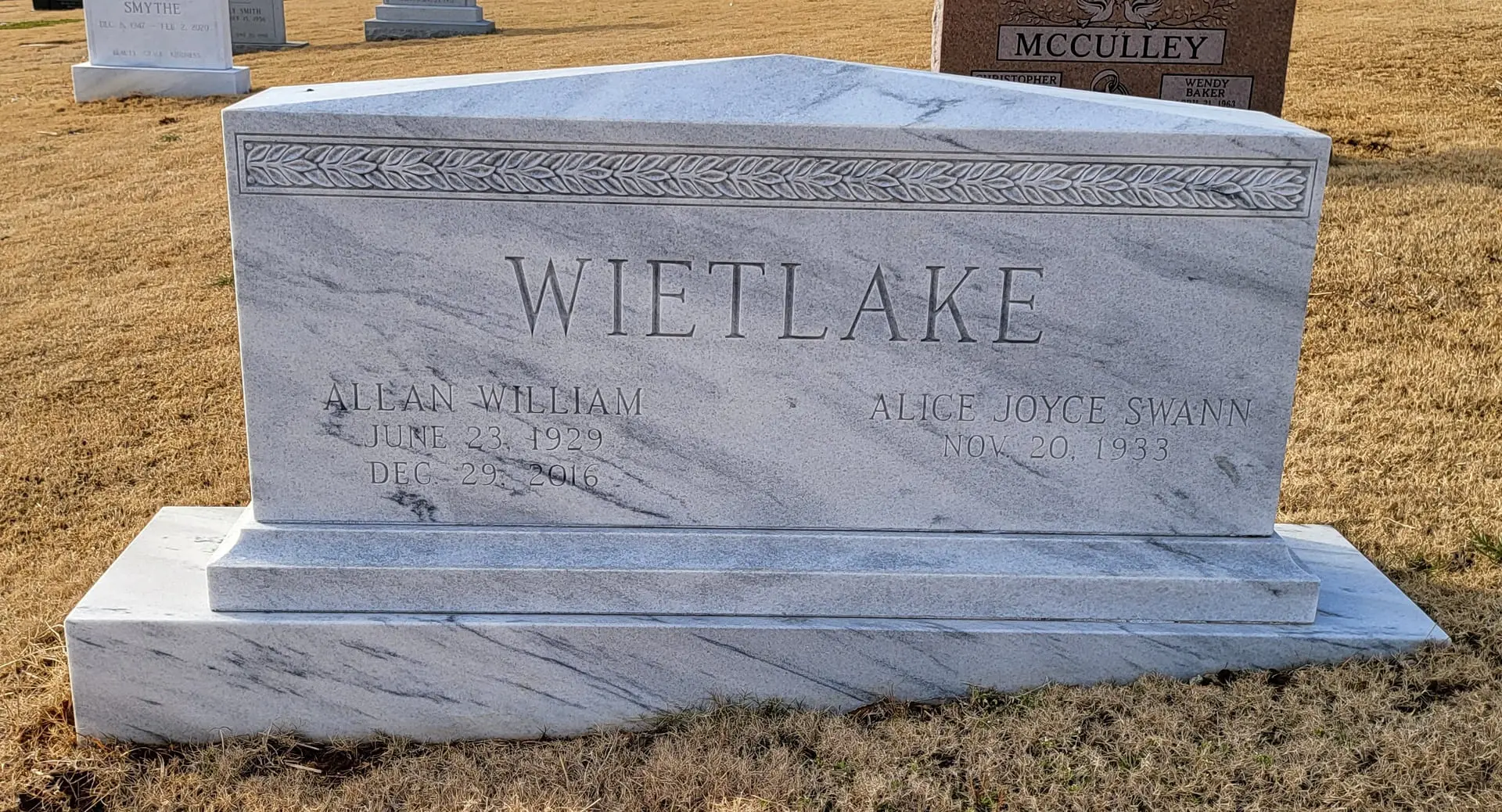 A memorial slab for Allan William and Alice Joyce Swann