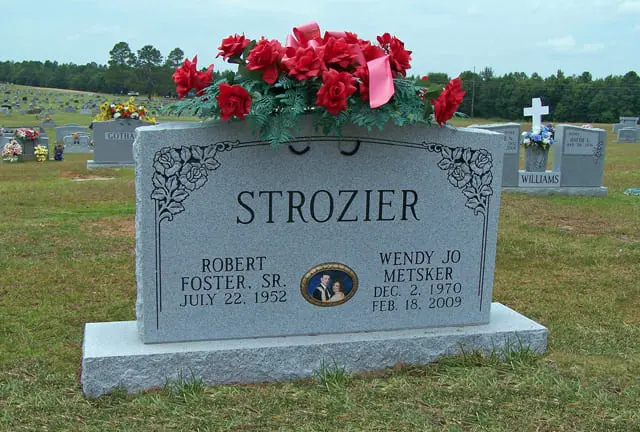 A memorial slab for Robert Foster. SR and Wendy Jo Metsker