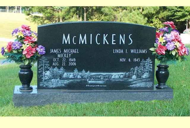A memorial slab for Mcmickens at the graveyard
