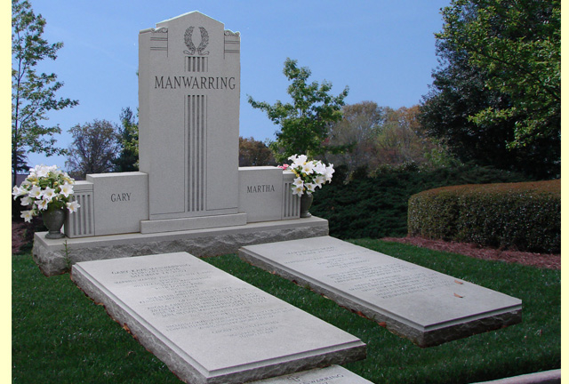 A memorial slab with the name Gary and Martha Manwarring