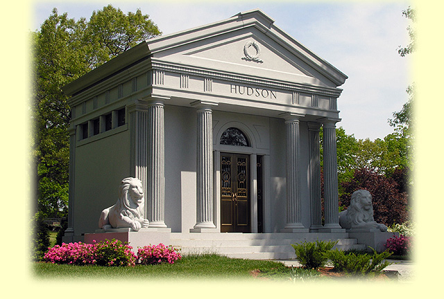 A beautiful crafted mausoleum with the name Hudson