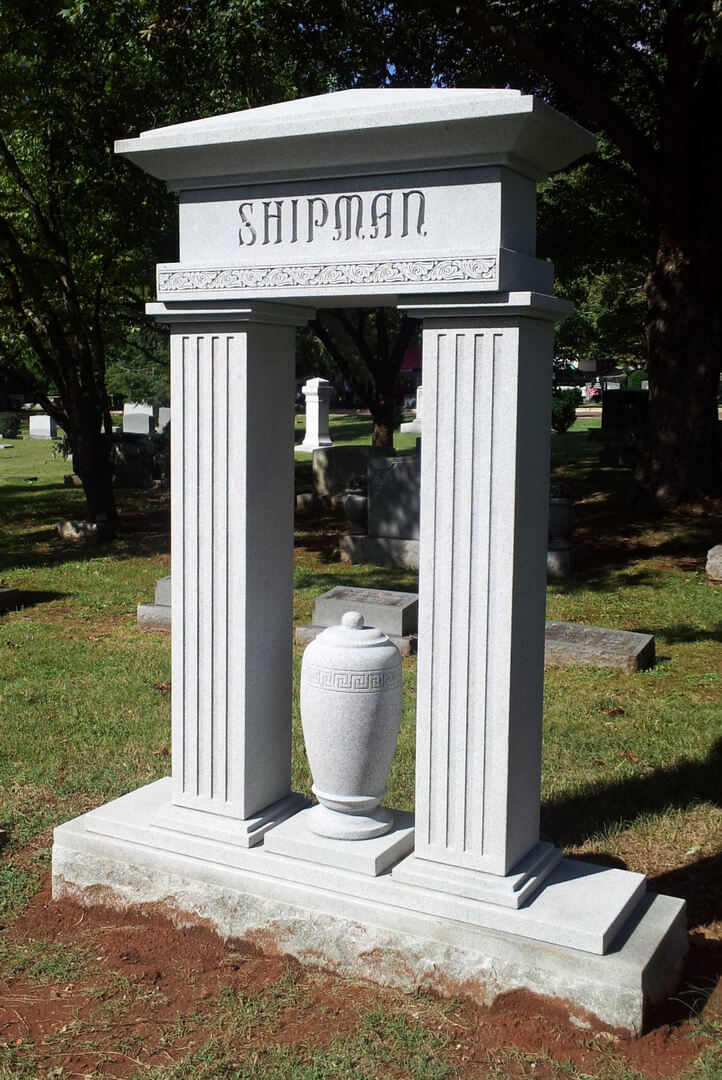 A unique shaped mausoleum with the name Shipman