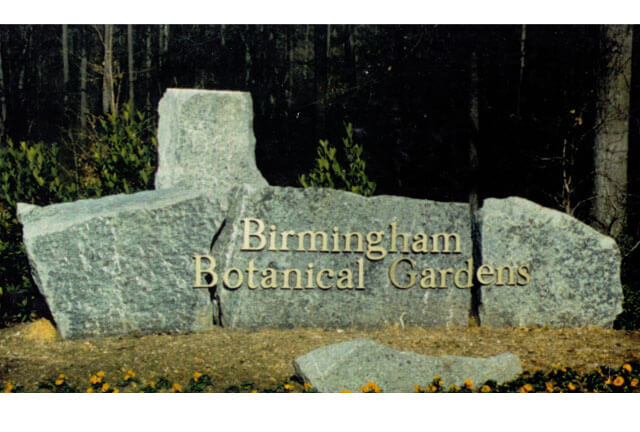 A signboard that says Birmingham Botanical Gardens