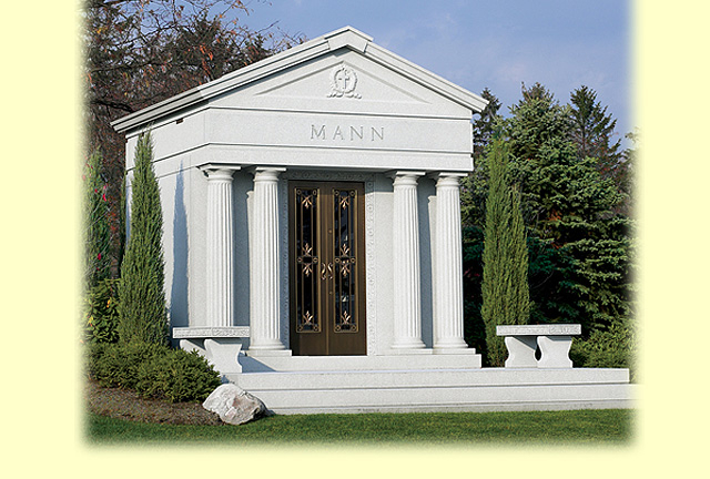 A beautiful crafted mausoleum with the name Mann