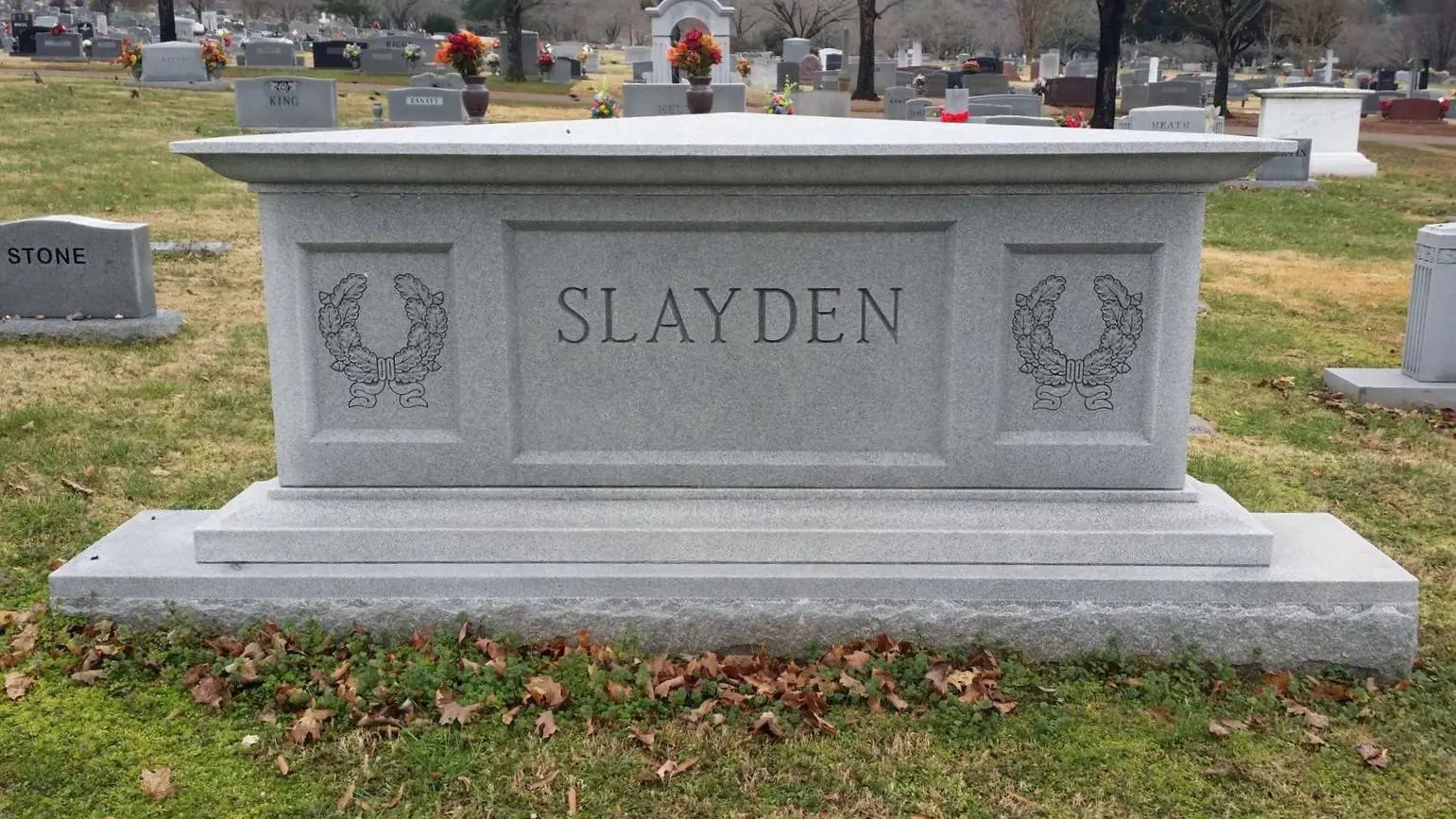 A memorial slab with the name and illustration of Slayden