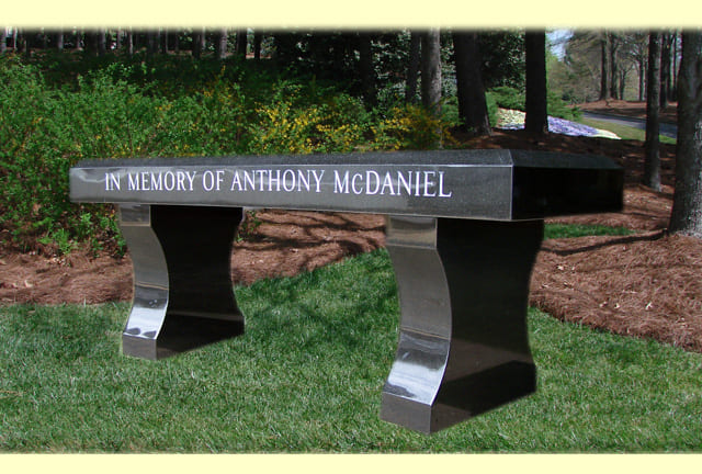 A beautiful picture of a bench in the memory of Anthony Mcdaniel