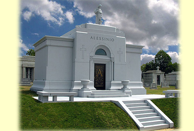 A beautiful crafted mausoleum with the name Alessinio