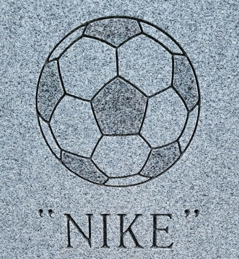 A beautiful piece of artwork of a football and text that says NIKE