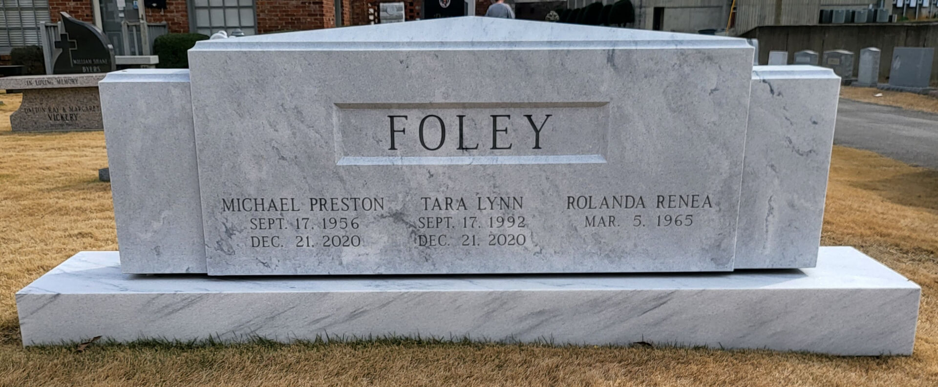 A memorial slab with the name Michel Preston and Tara Lynn