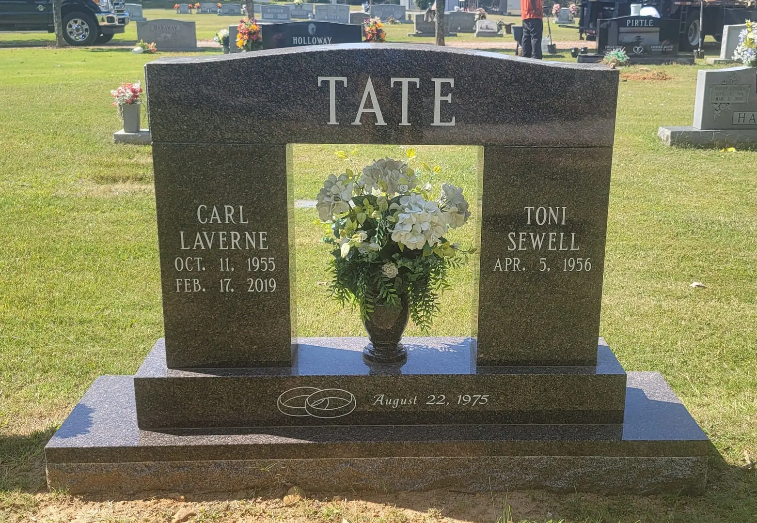 A memorial slab for Carl Laverne and Toni Sewell