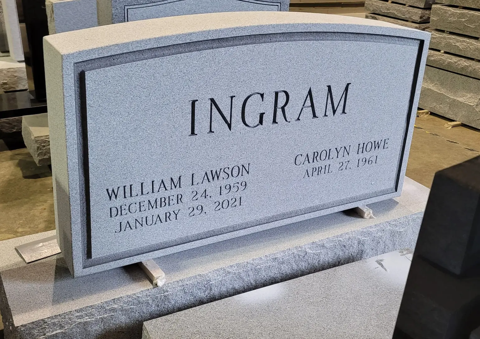 A memorial slab for Willian Lawson and Carolyn Howe