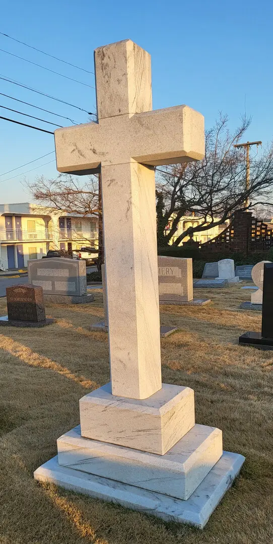 A memorial slab design of a cross at the graveyard