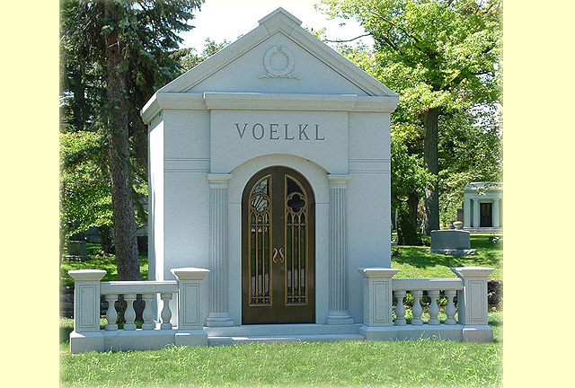 A beautiful crafted mausoleum with the name Voelkl