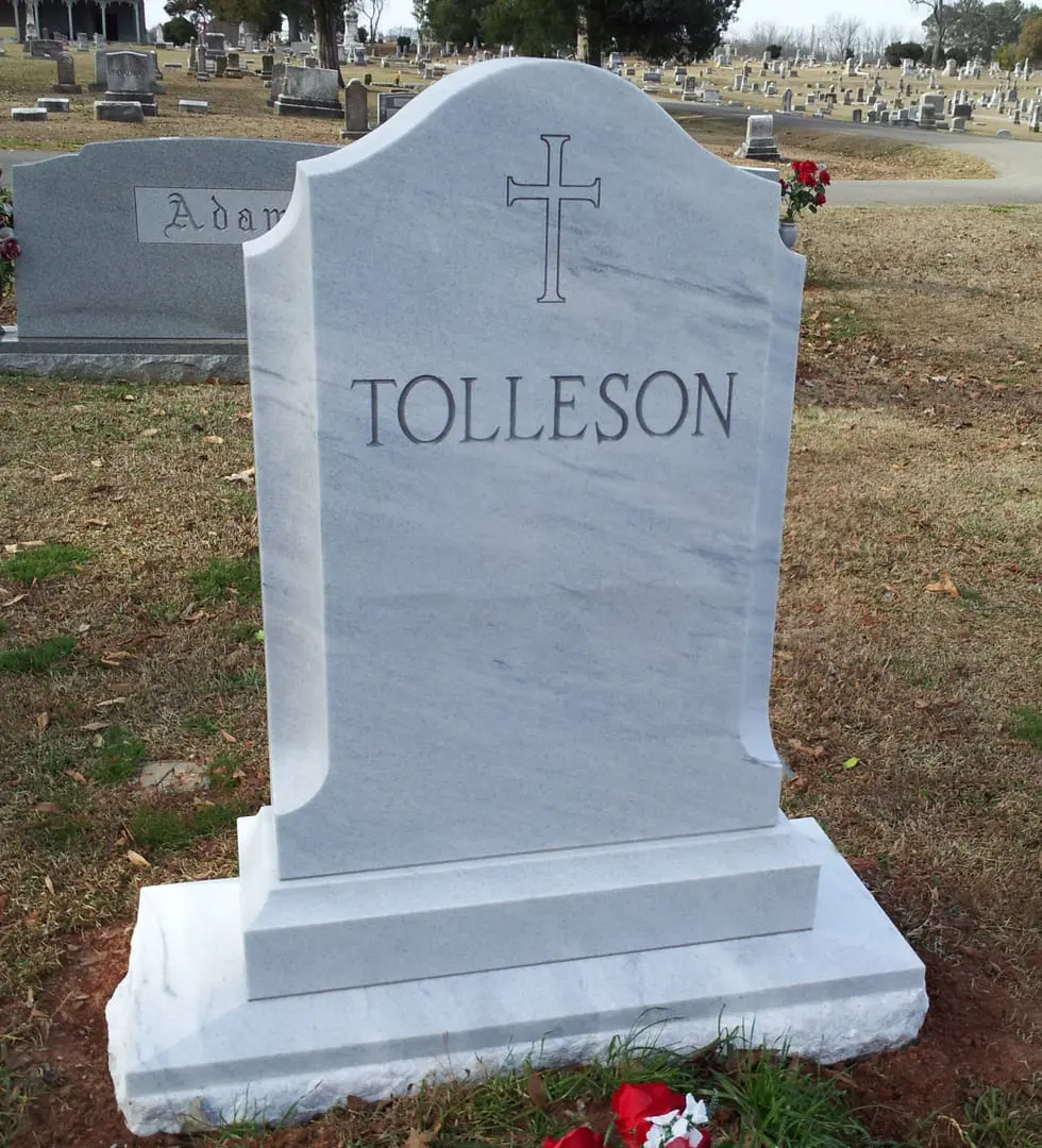A memorial slab for Tolleson at the grave yard