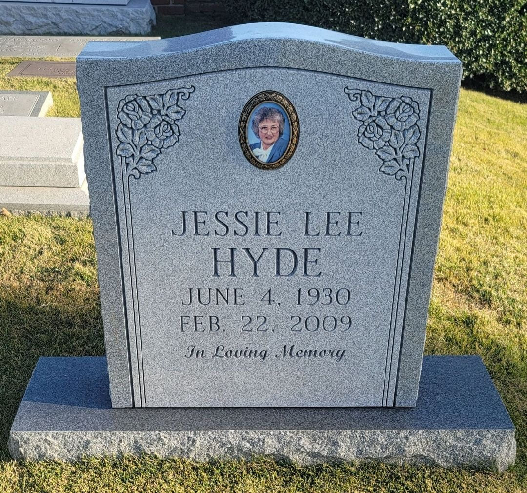 A memorial slab for Jessie Lee Hyde with picture