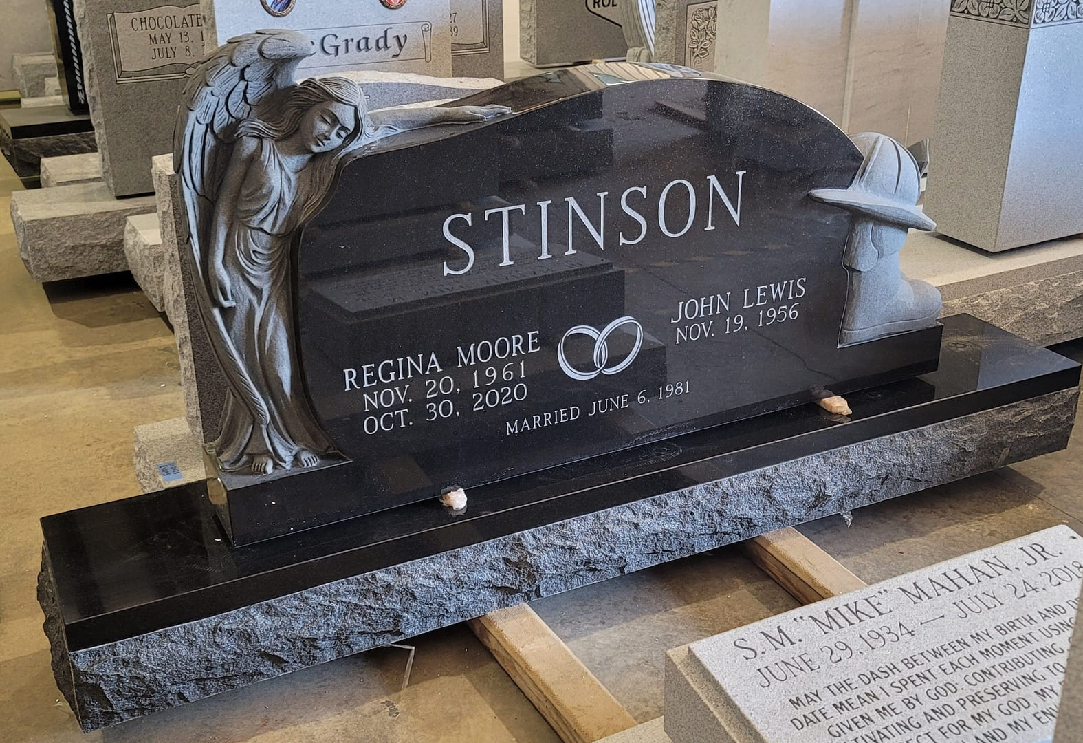 A memorial slab for Regina Moore and John Lewis