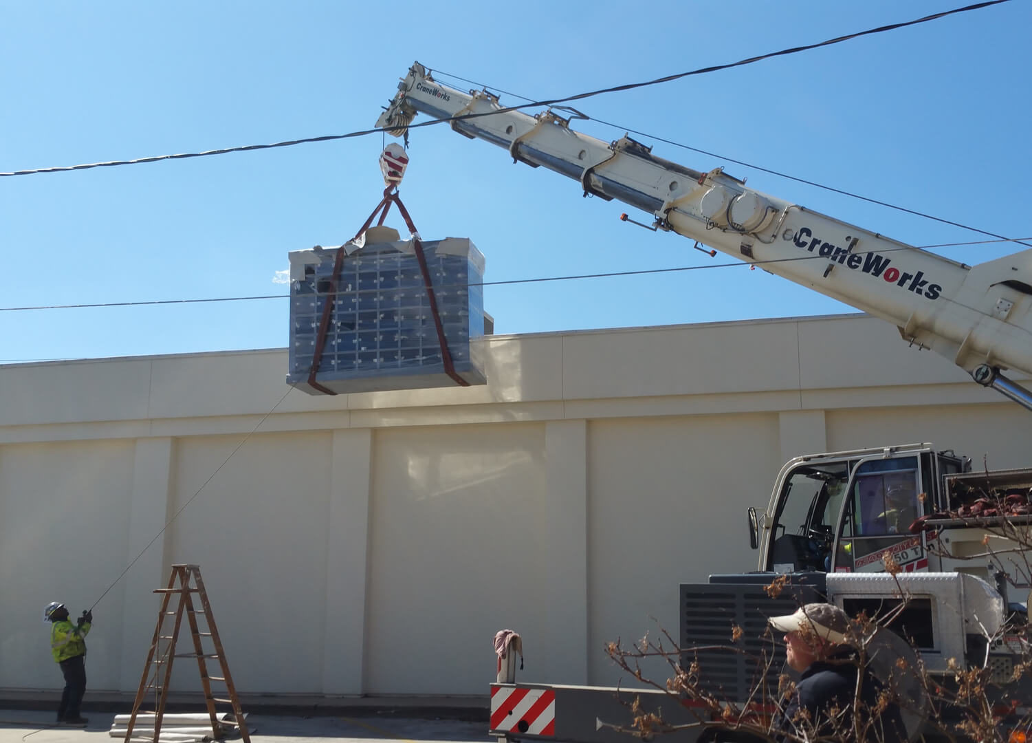A Crane Carrying a Marble Block
