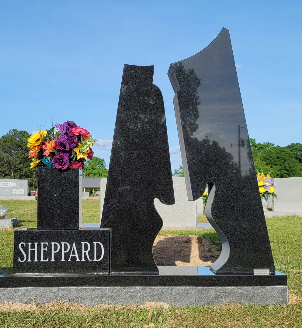 A stone carving design of Sheppard with flowers