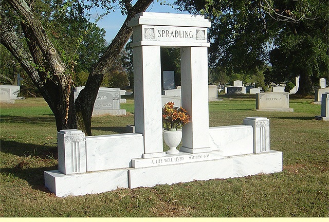 A unique shaped mausoleum with the name Spradling