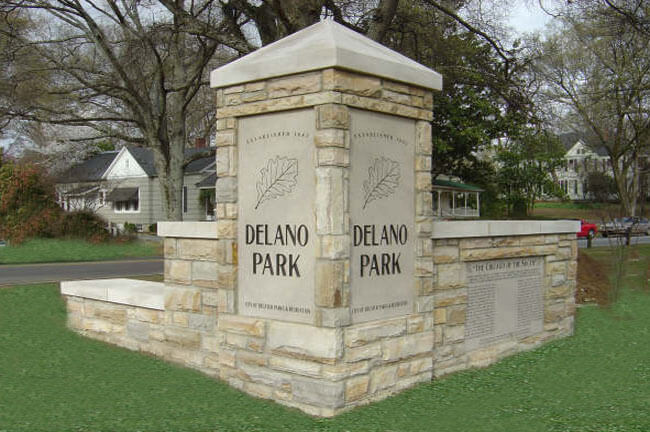 A beautiful crafted mausoleum with the name Delano park