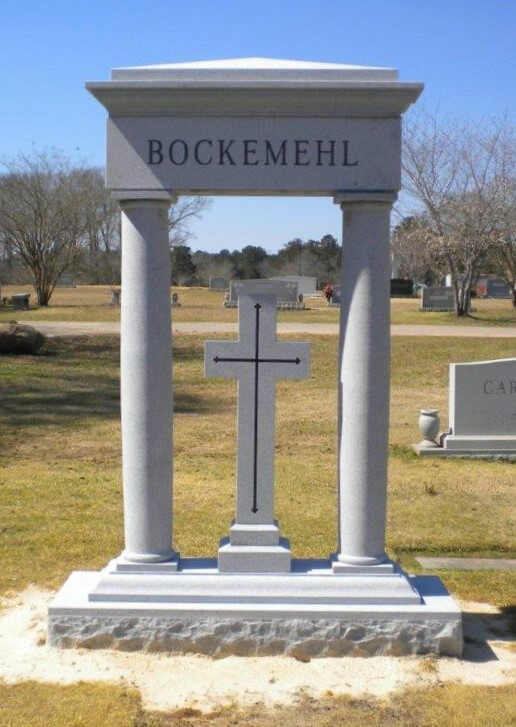 A cross shaped memorial slab with the name Bockemehl