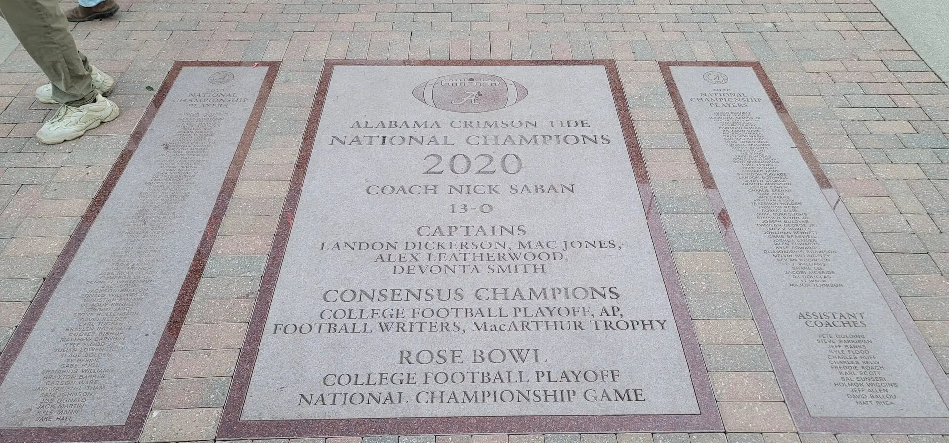 A memorial engraving about Alabama National Champions on the floor