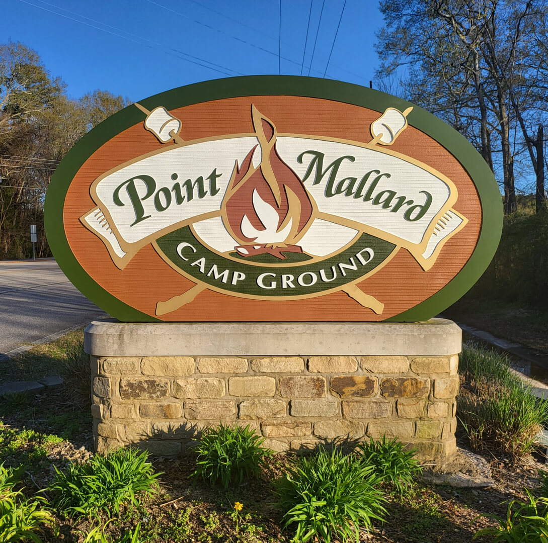 A signboard that says Point Mallard Camp Ground