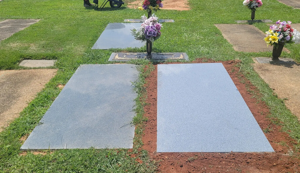 A Tombstone With Two Granite Slabs
