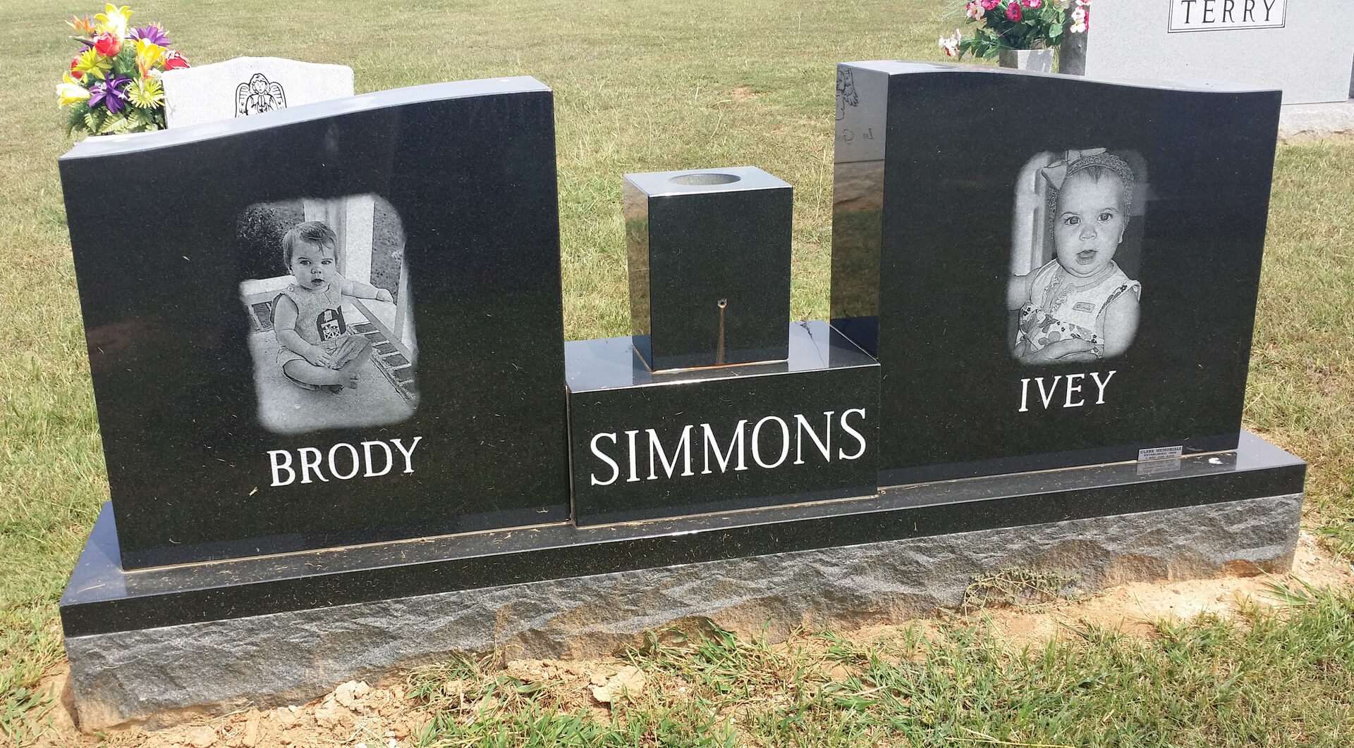A memorial slab with the name Brody and Ivey Simmons